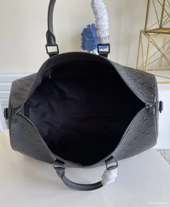 First bag ru VUITTON 50 KEEPALL LOUIS BANDOULIÈRE 0520